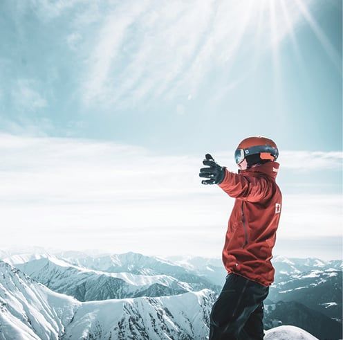 Skier viewing mountainscape