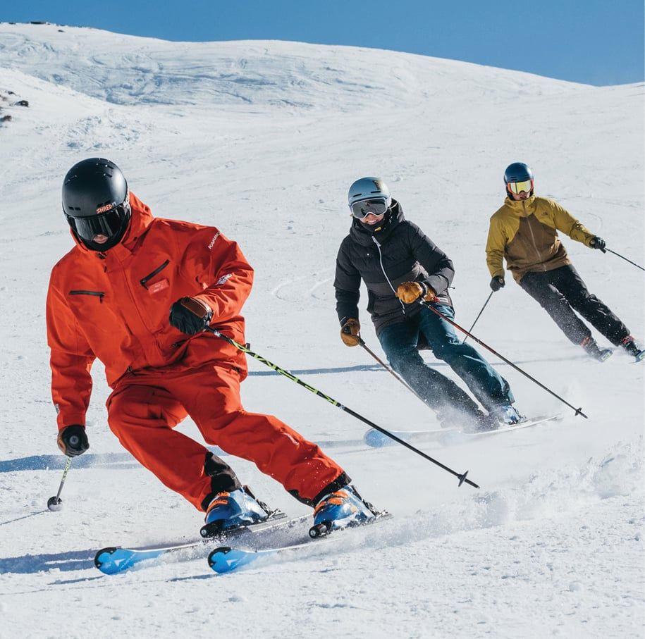 Three Skiers